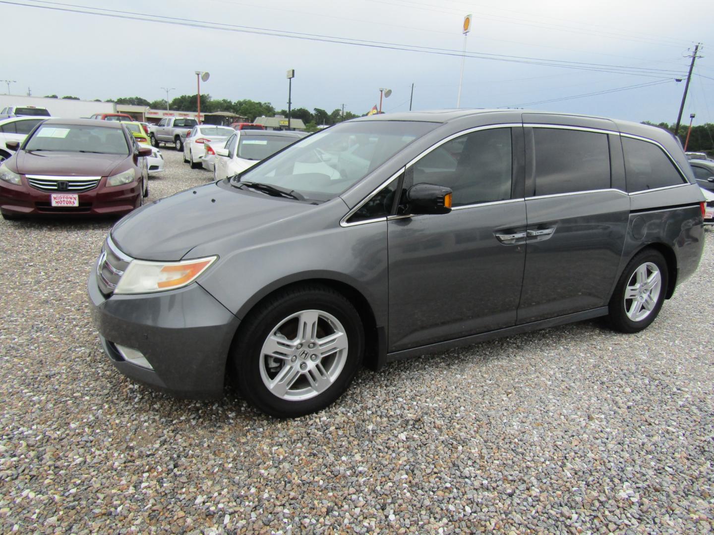 2013 Gray /Gray Honda Odyssey Touring (5FNRL5H97DB) with an 3.5L V6 SOHC 24V engine, Automatic transmission, located at 15016 S Hwy 231, Midland City, AL, 36350, (334) 983-3001, 31.306210, -85.495277 - Photo#2